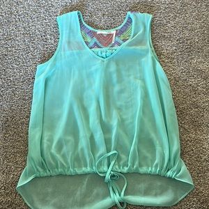 Sheer high low tank with embroidery on back